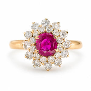 A yellow gold vintage, 1980s Burmese ruby & diamond halo cluster ring.