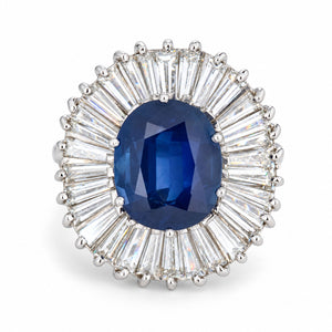 Front view of a vintage 1950s blue sapphire and baguette-cut diamond ballerina cluster cocktail ring in 18ct white gold.