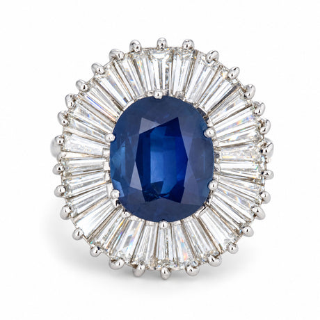 Front view of a vintage 1950s blue sapphire and baguette-cut diamond ballerina cluster cocktail ring in 18ct white gold.