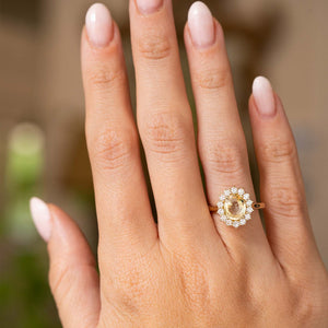 Antique-inspired, yellow sapphire and diamond cluster engagement ring