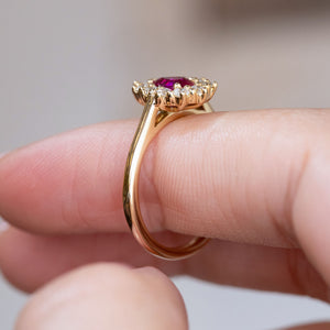 Side profile of the vintage-inspired ruby cluster ring, showing its elevated setting and slim yellow gold band.