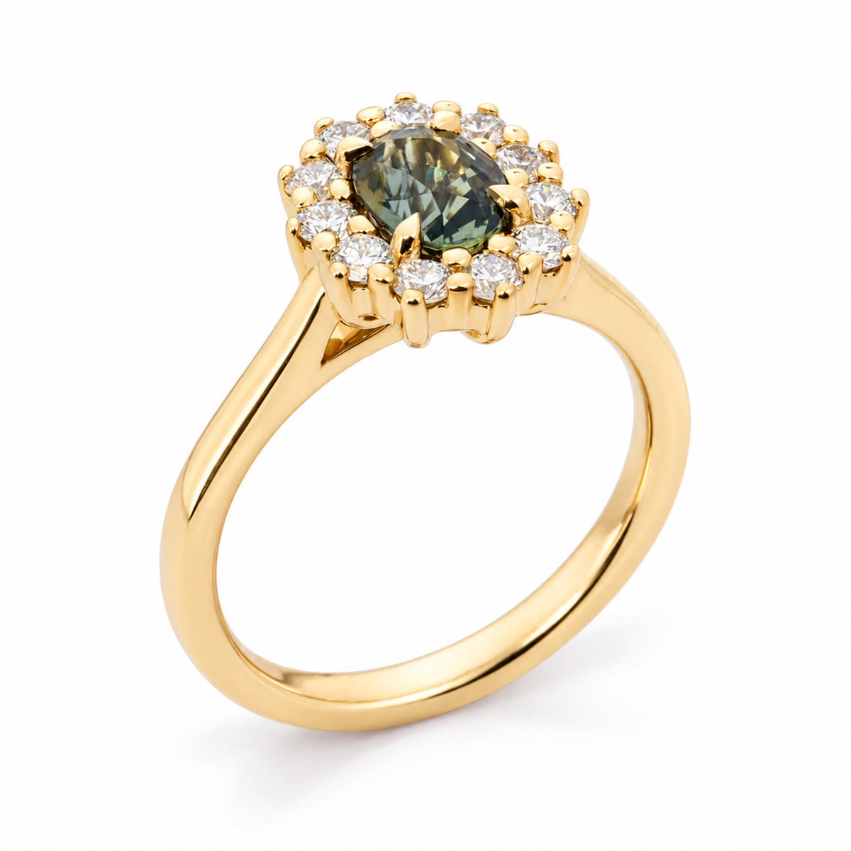Three-quarter perspective showcasing the oval green sapphire, sparkling diamond cluster and elevated yellow gold basket setting.
