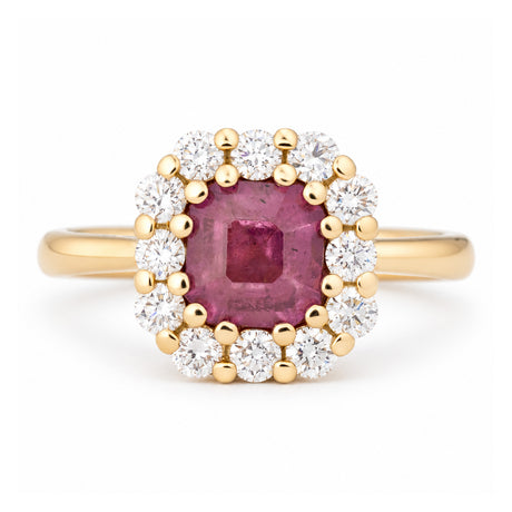 Antique-inspired step-cut pink sapphire and diamond cluster engagement ring in yellow gold, surrounded by a halo of brilliant-cut white diamonds.