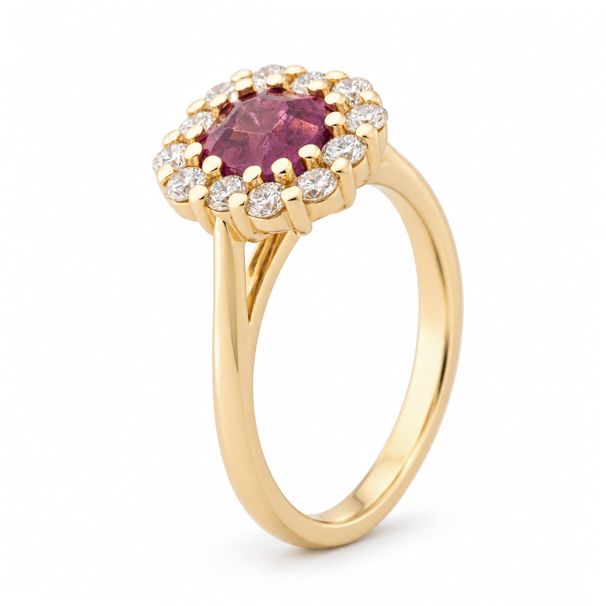 Angled view of the pink sapphire cluster ring, highlighting the raised claw setting and sparkling diamond surround.