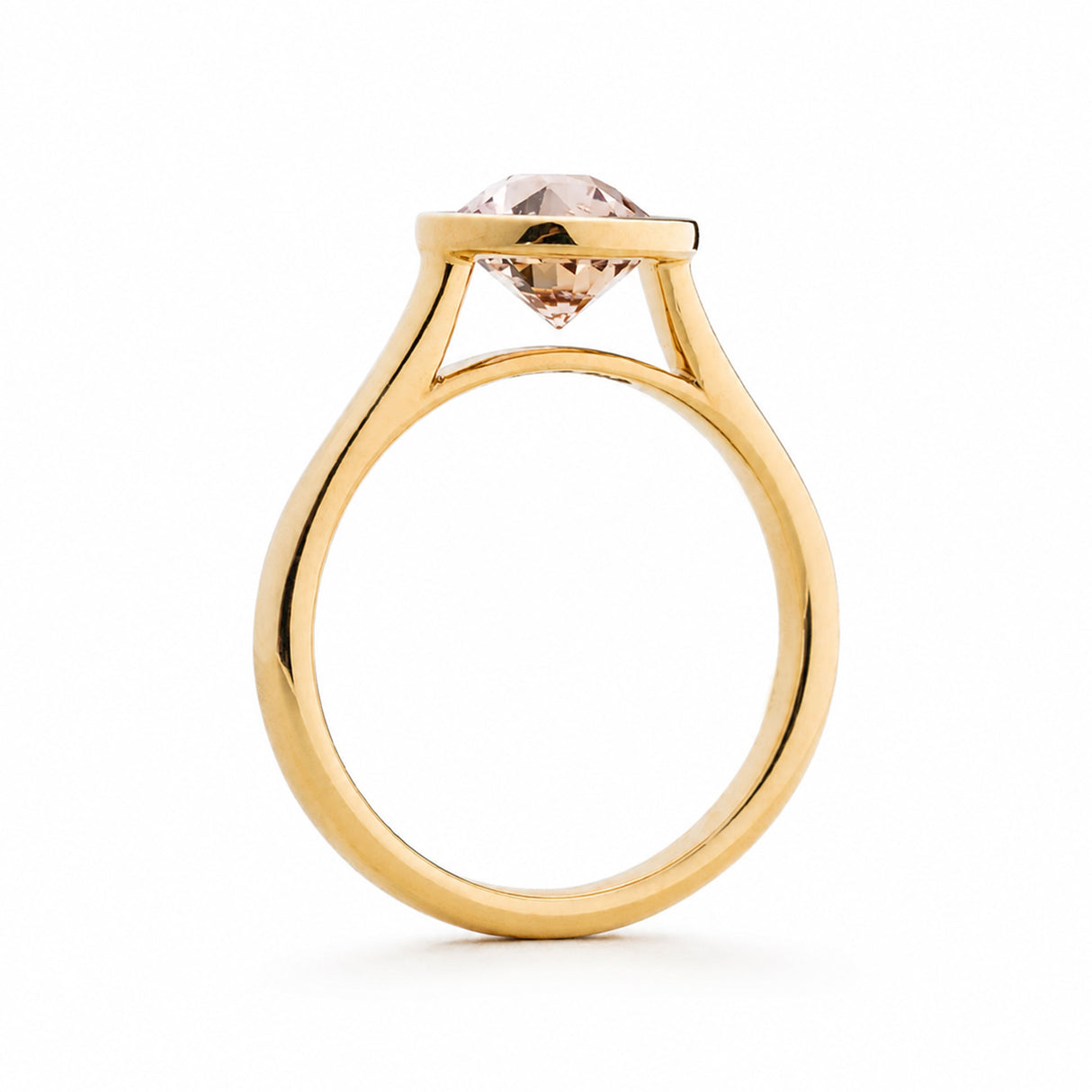 Antique-inspired, peach sapphire solitaire engagement ring