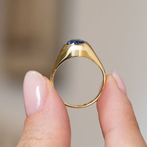 Reverse profile of the antique Victorian solitaire ring, showing the substantial gold setting and circular band.