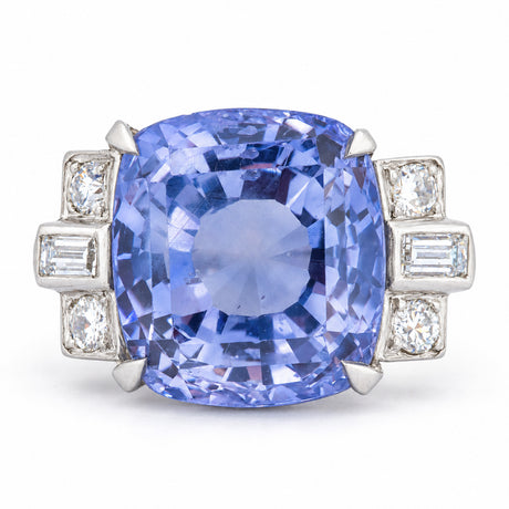 Vintage 1980s colour-change violet-blue sapphire and diamond cocktail ring in platinum, featuring a large cushion-shaped centre stone.