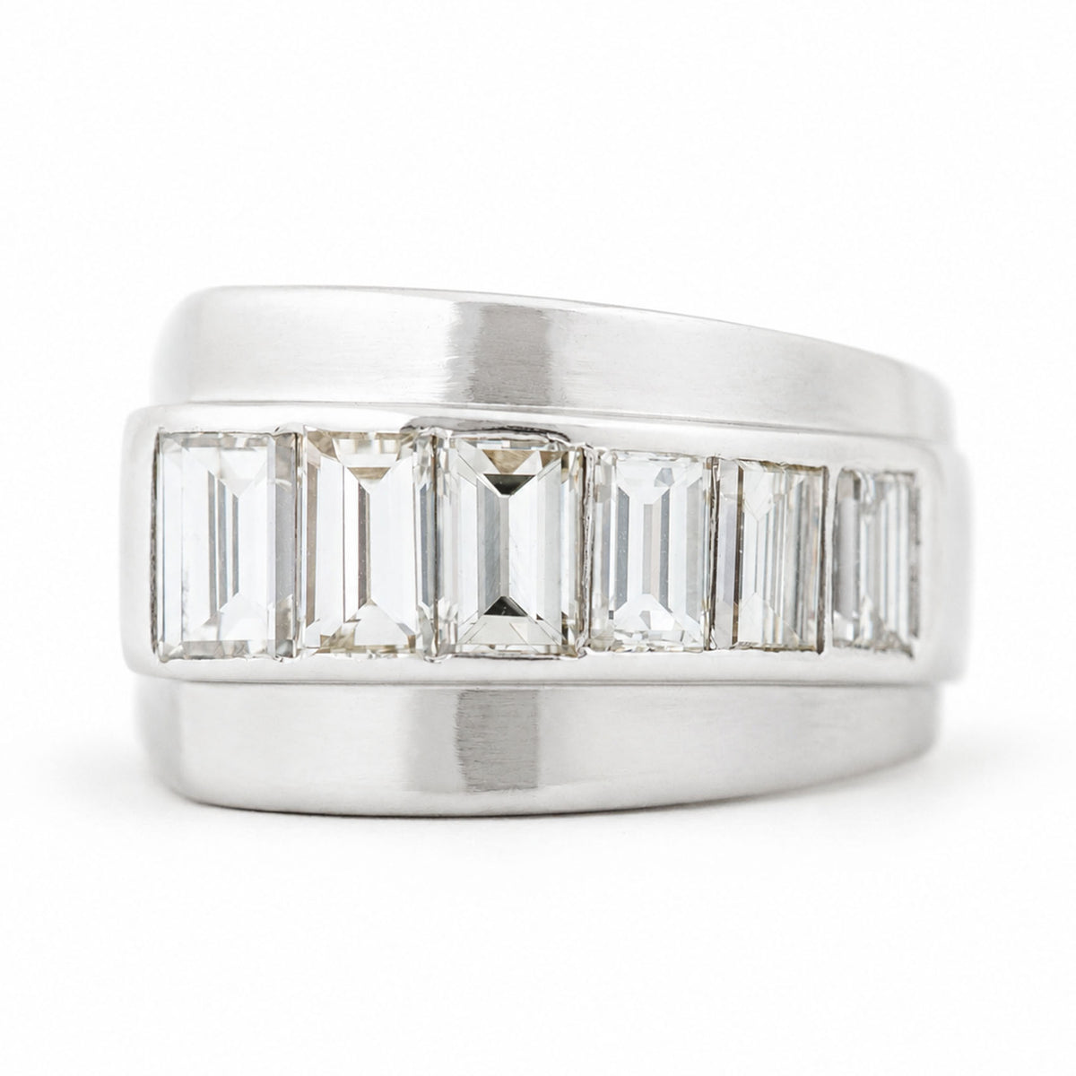 A large Vintage ring from the 1940s with channel-set baguette-cut diamonds set in platinum.