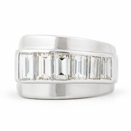 A large Vintage ring from the 1940s with channel-set baguette-cut diamonds set in platinum.