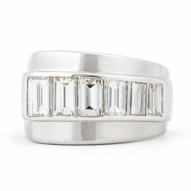 A large Vintage ring from the 1940s with channel-set baguette-cut diamonds set in platinum.