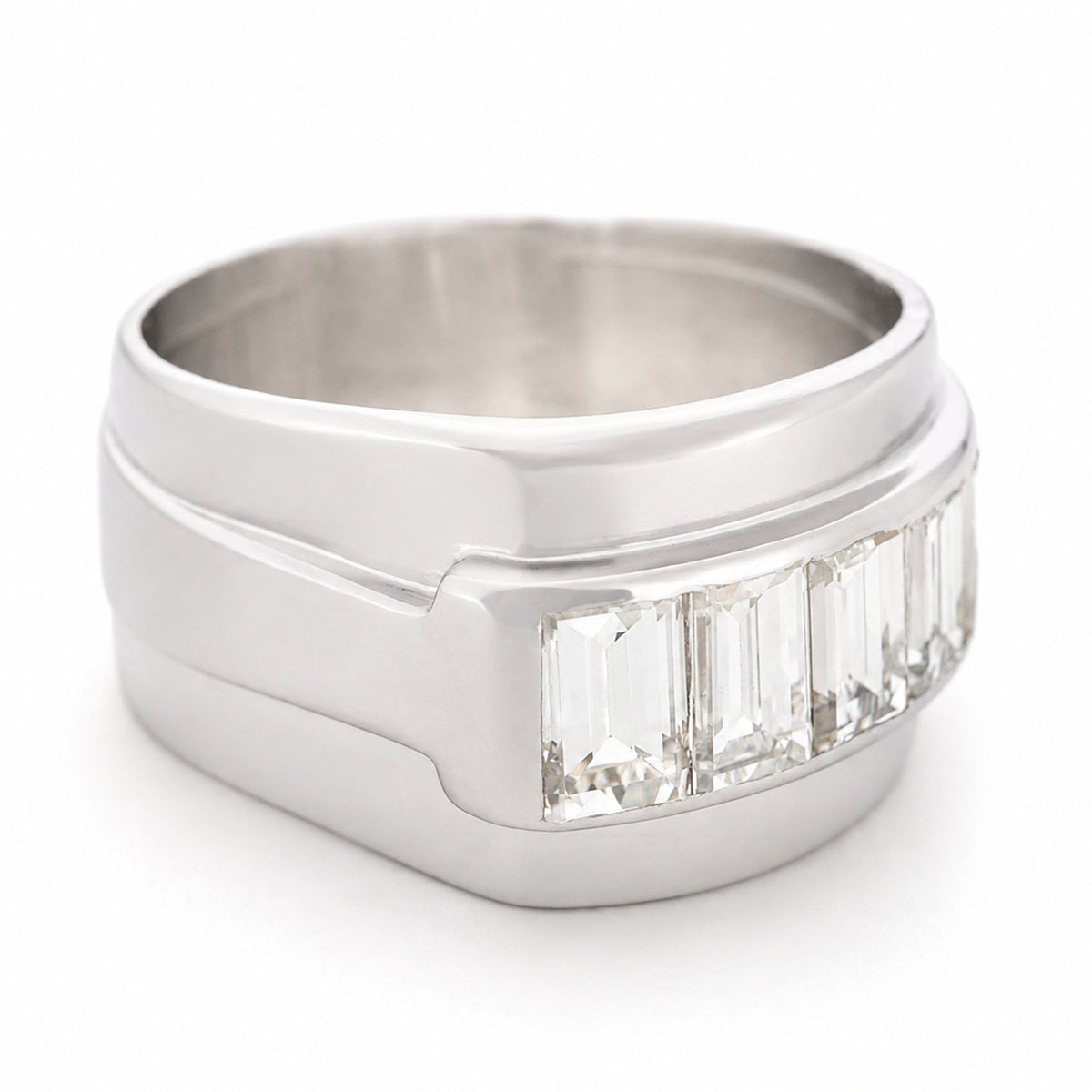 A side profile of a platinum Vintage ring featuring a row of natural baguette-cut diamonds.