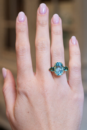 Aquamarine and sea-green tourmaline three-stone cocktail ring
