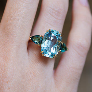 Aquamarine and sea-green tourmaline three-stone cocktail ring