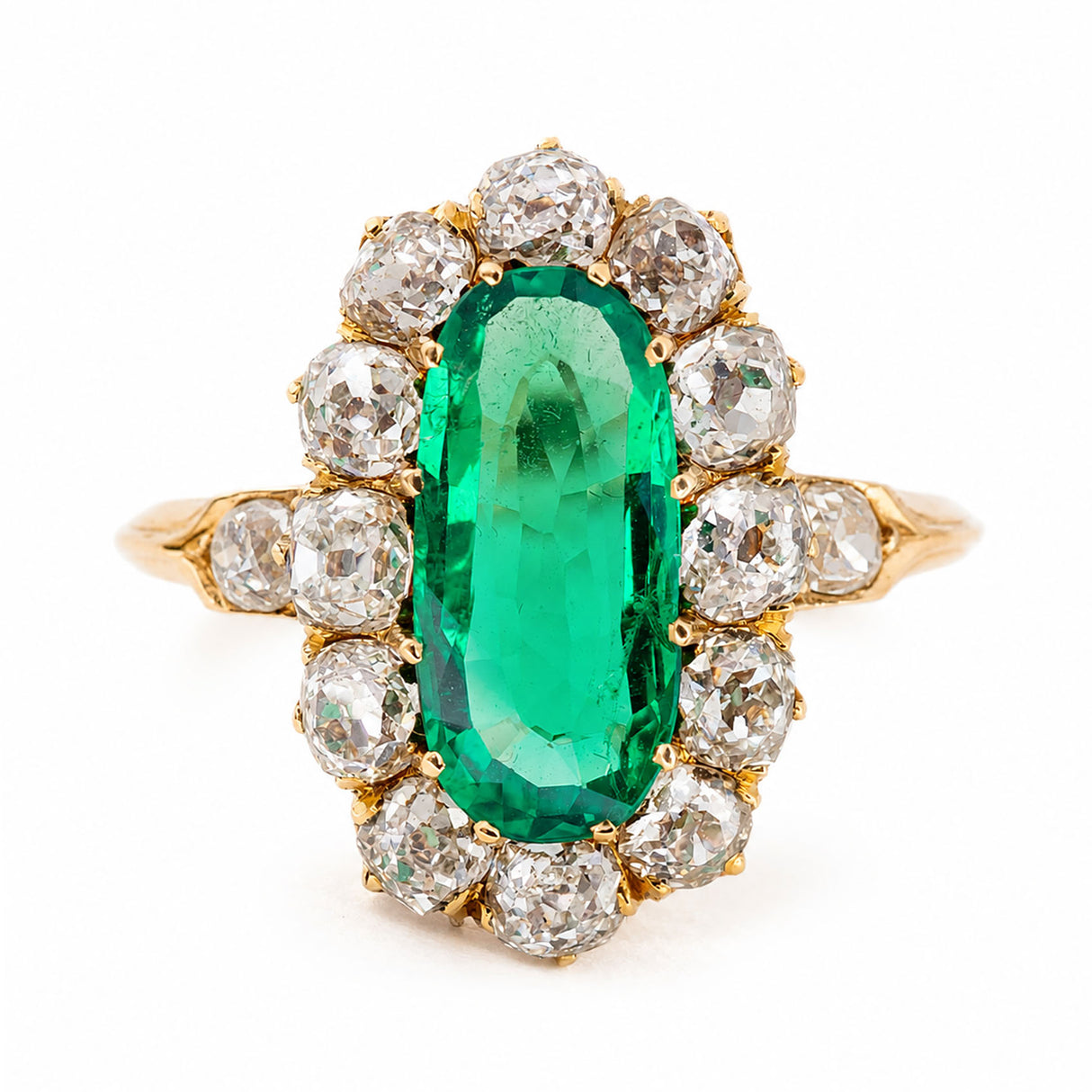 Antique, Belle Époque Colombian emerald and diamond cluster engagement ring