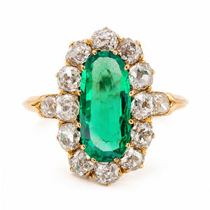 Antique, Belle Époque Colombian emerald and diamond cluster engagement ring