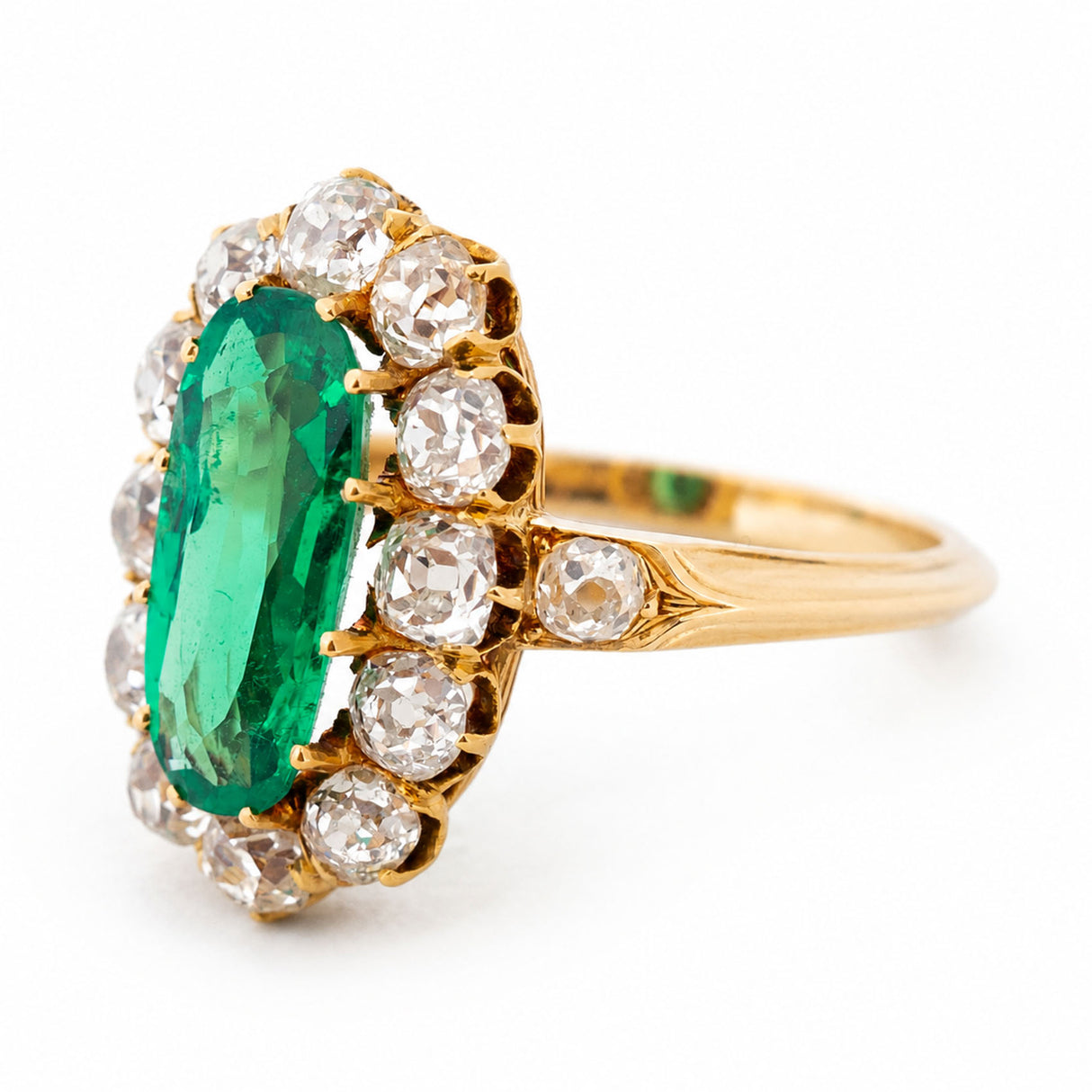 Antique, Belle Époque Colombian emerald and diamond cluster engagement ring