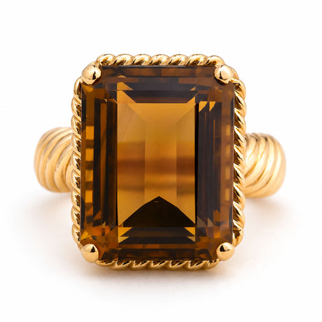 A vintage Cartier cocktail ring from the 1970s featuring a brown coloured smoky quartz.