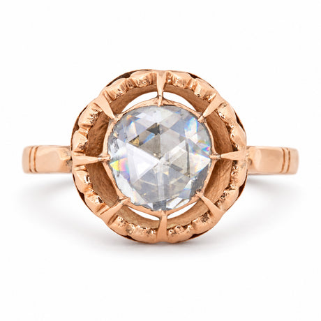 Antique Victorian solitaire ring featuring a large rose-cut diamond in an ornate openwork setting of warm 12ct yellow gold.