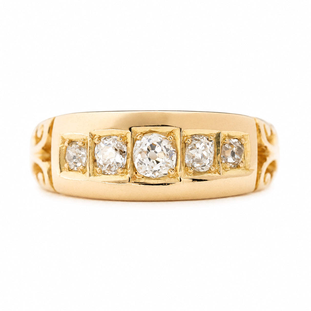 An Antique, Victorian diamond five-stone engagement ring in yellow gold shown against a plain white background.