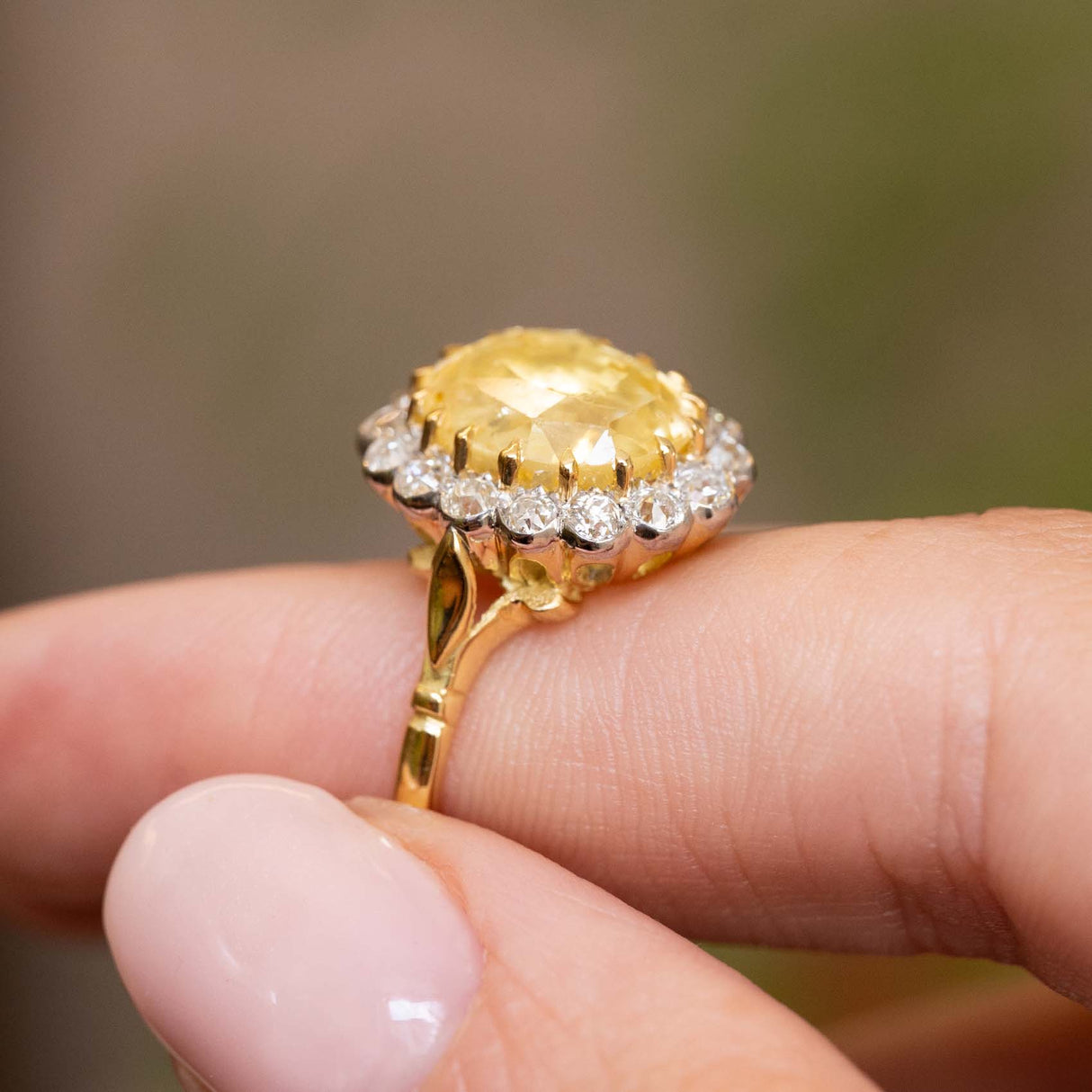 Vintage, 1950s yellow sapphire and diamond cluster engagement ring