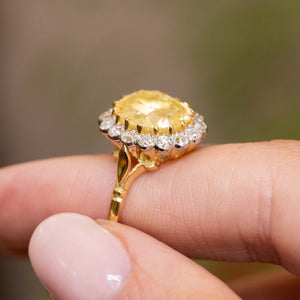 Vintage, 1950s yellow sapphire and diamond cluster engagement ring