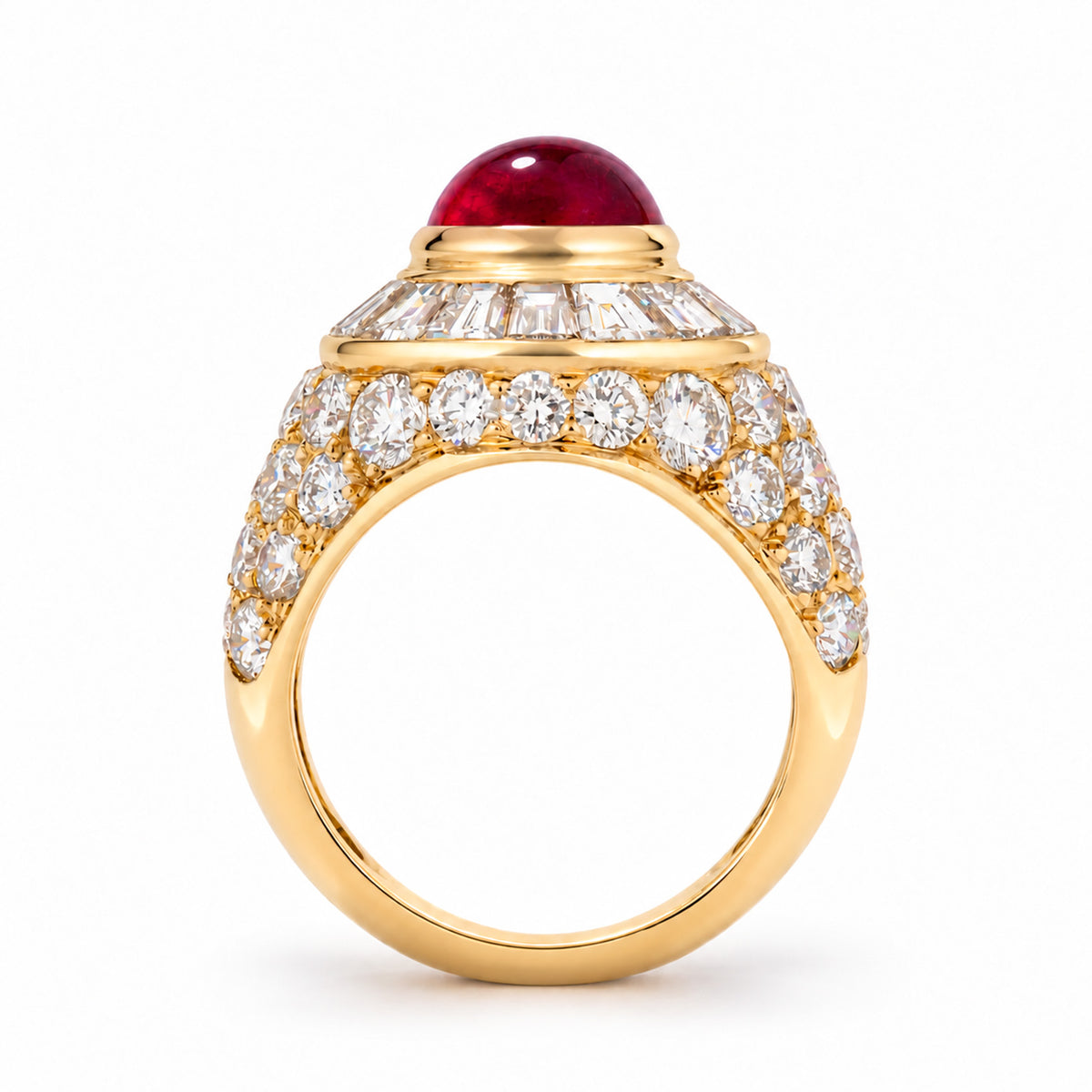 Architectural profile of the vintage Asprey bombé ring, revealing its domed ruby and richly diamond-set yellow gold mount.