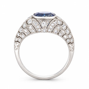 Side profile of a Belle Époque sapphire and rose-cut diamond ring, showcasing its domed silhouette and ornate platinum openwork.