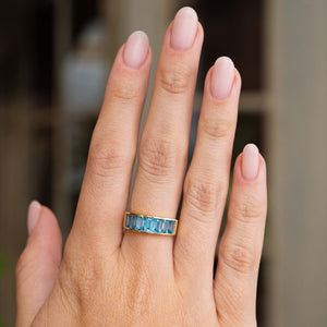 Vintage, 1980s Swiss blue topaz half eternity ring