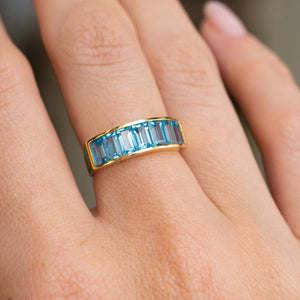 Vintage, 1980s Swiss blue topaz half eternity ring