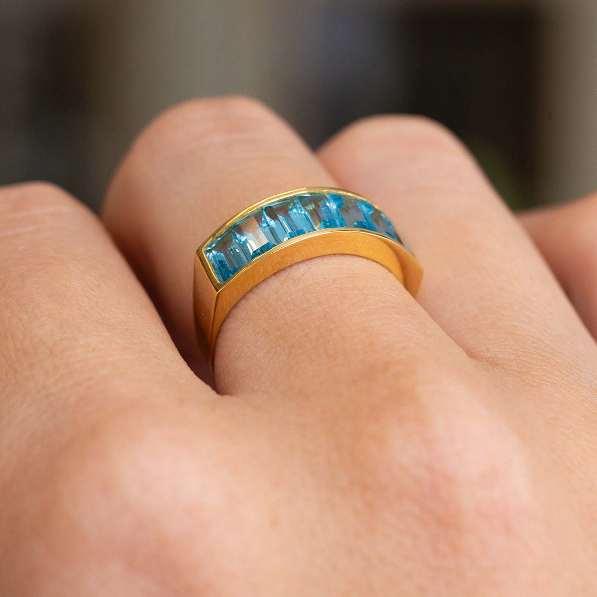Vintage, 1980s Swiss blue topaz half eternity ring