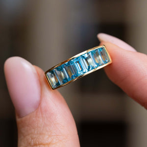 Vintage, 1980s Swiss blue topaz half eternity ring