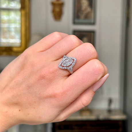 Vintage tiffany & co diamond ring, worn on closed hand. 