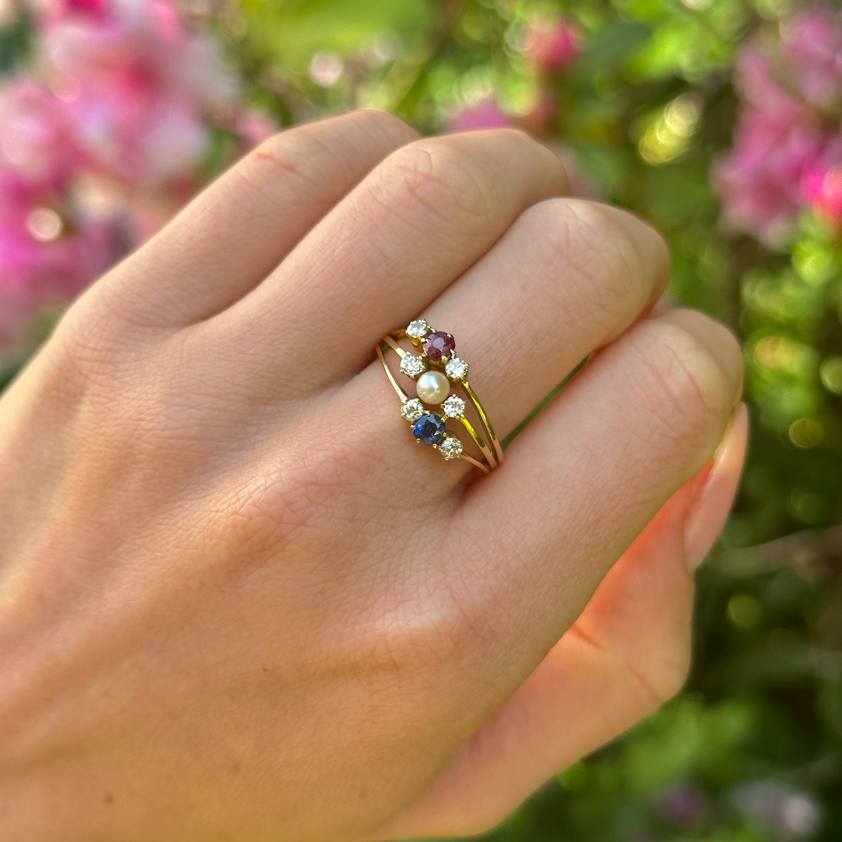 Antique Victorian, sapphire, ruby and pearl ring, 18ct Yellow Gold worn on hand.
