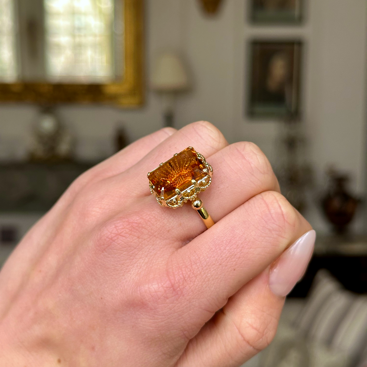 Antique, 1880s Citrine Ring with Rope Metal Work, worn on closed hand.