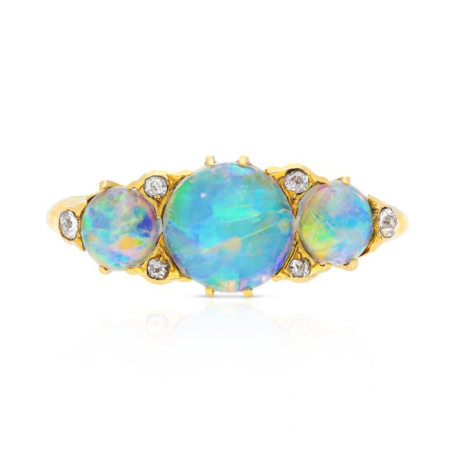 Opal and diamond three stone ring, front view. 