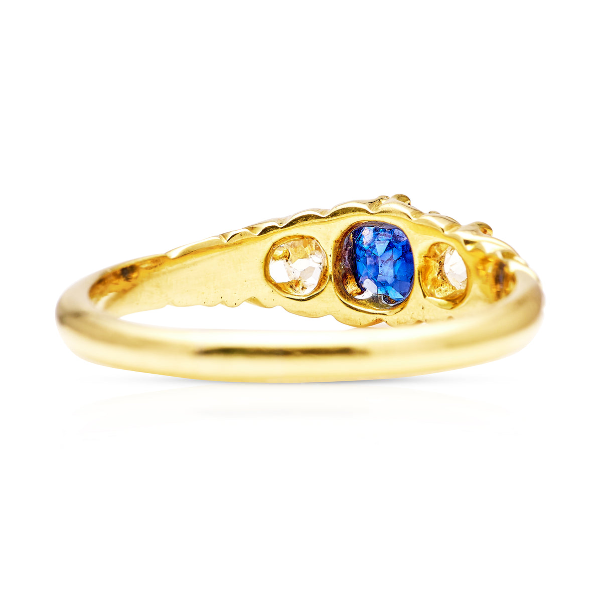 Antique, Edwardian sapphire and diamond three-stone ring, 18ct yellow gold