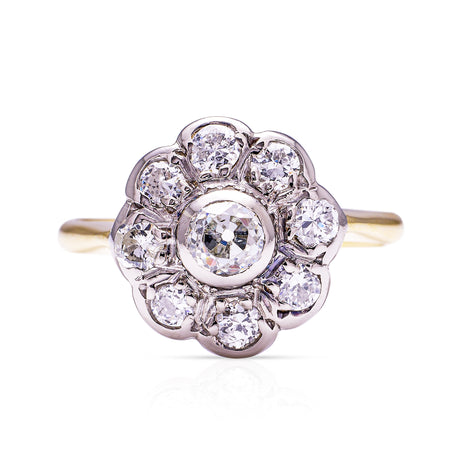 antique diamond daisy cluster engagement ring, front view. 