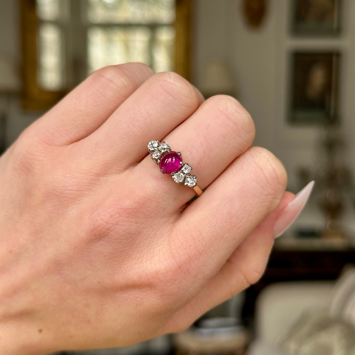 Antique, Edwardian Cabochon Ruby and Diamond Ring, worn on closed hand.