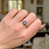 Antique, Edwardian Sapphire and Diamond Cluster Ring, worn on closed hand.