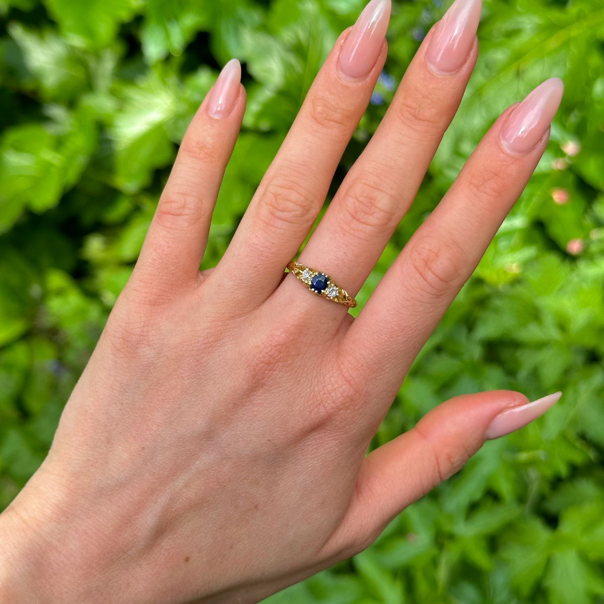 Antique, Edwardian Sapphire and Diamond Three-Stone Ring, 18ct Yellow Gold worn on hand.