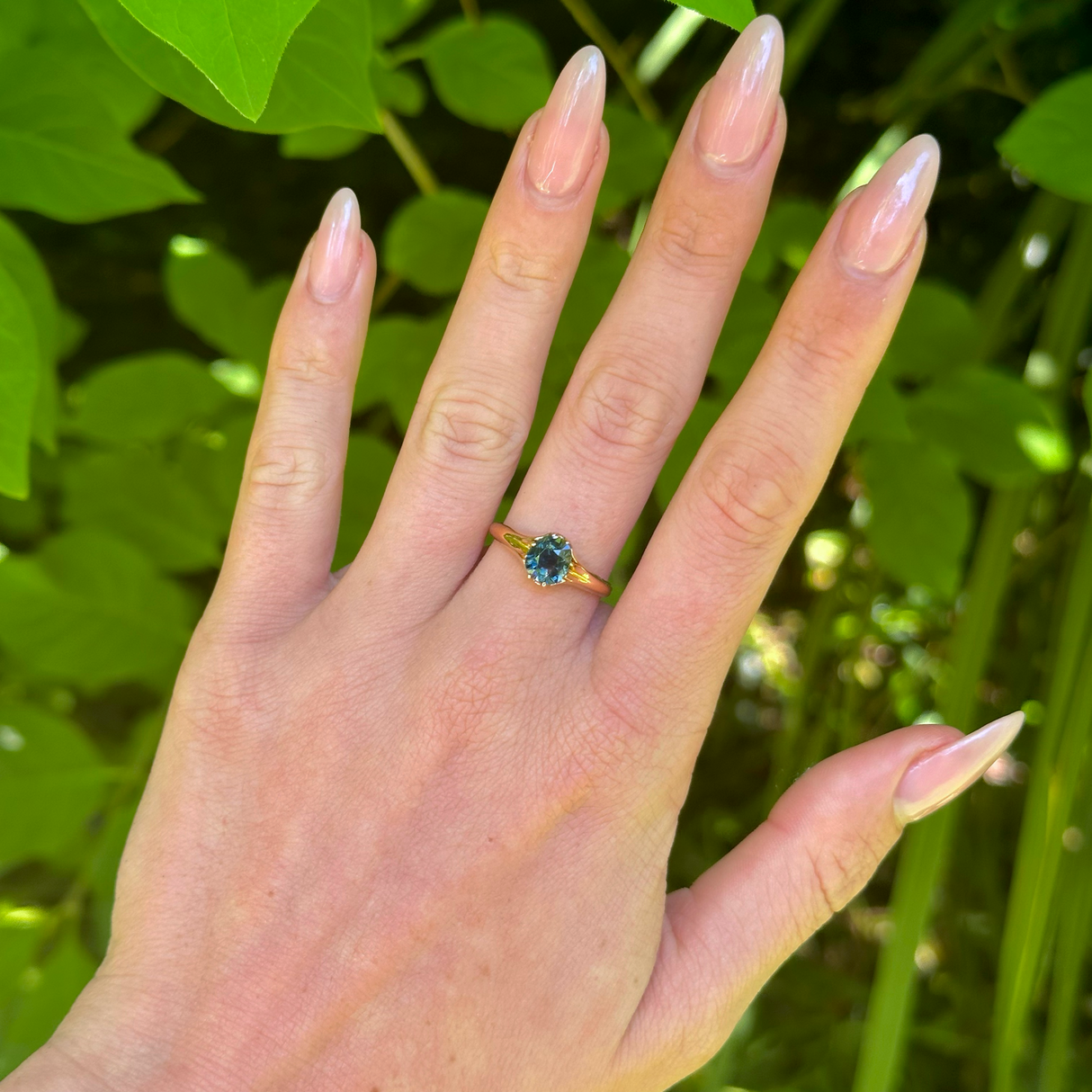 Antique, Edwardian Single-Stone Old Cut Teal Sapphire Ring, 18ct Rosy Yellow Gold worn on hand.