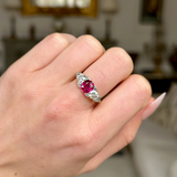 Antique, Edwardian Three Stone Ruby and Diamond Engagement Ring, worn on closed hand.