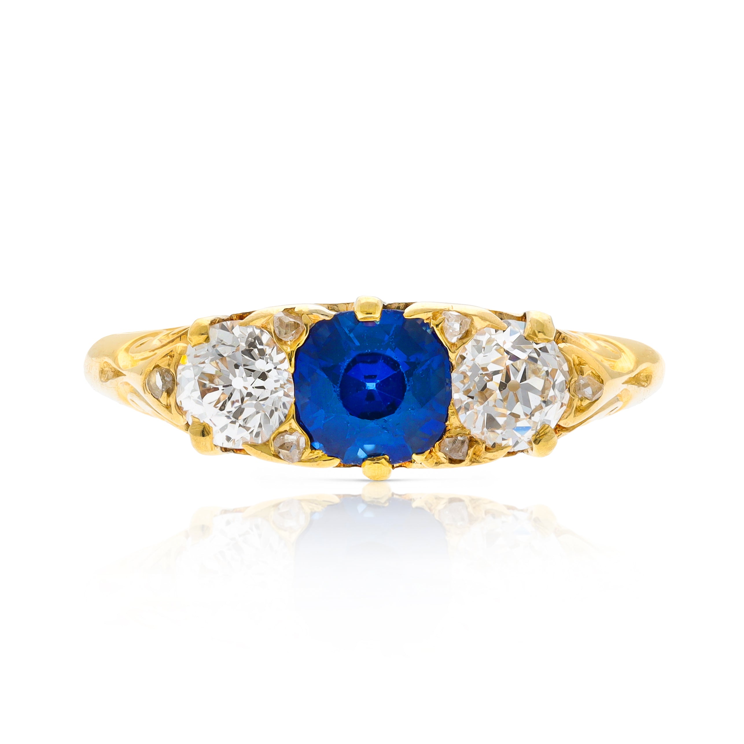 Antique, Edwardian, sapphire and diamond, carved three stone engagement ring, 18ct yellow gold