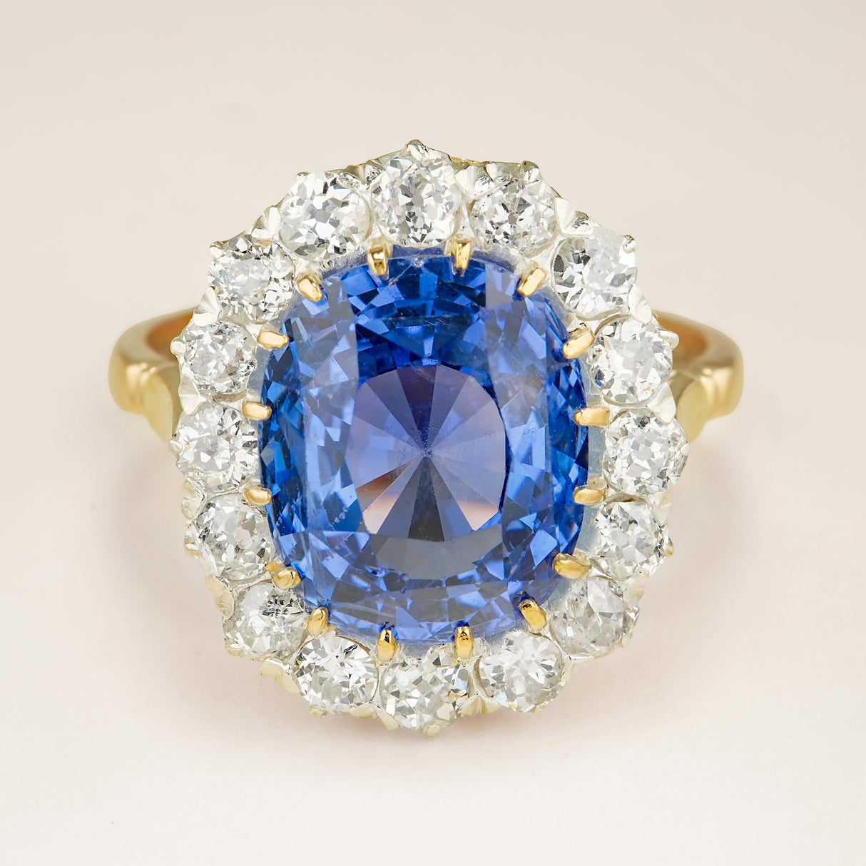 Antique, Edwardian sapphire and diamond cluster engagement ring
