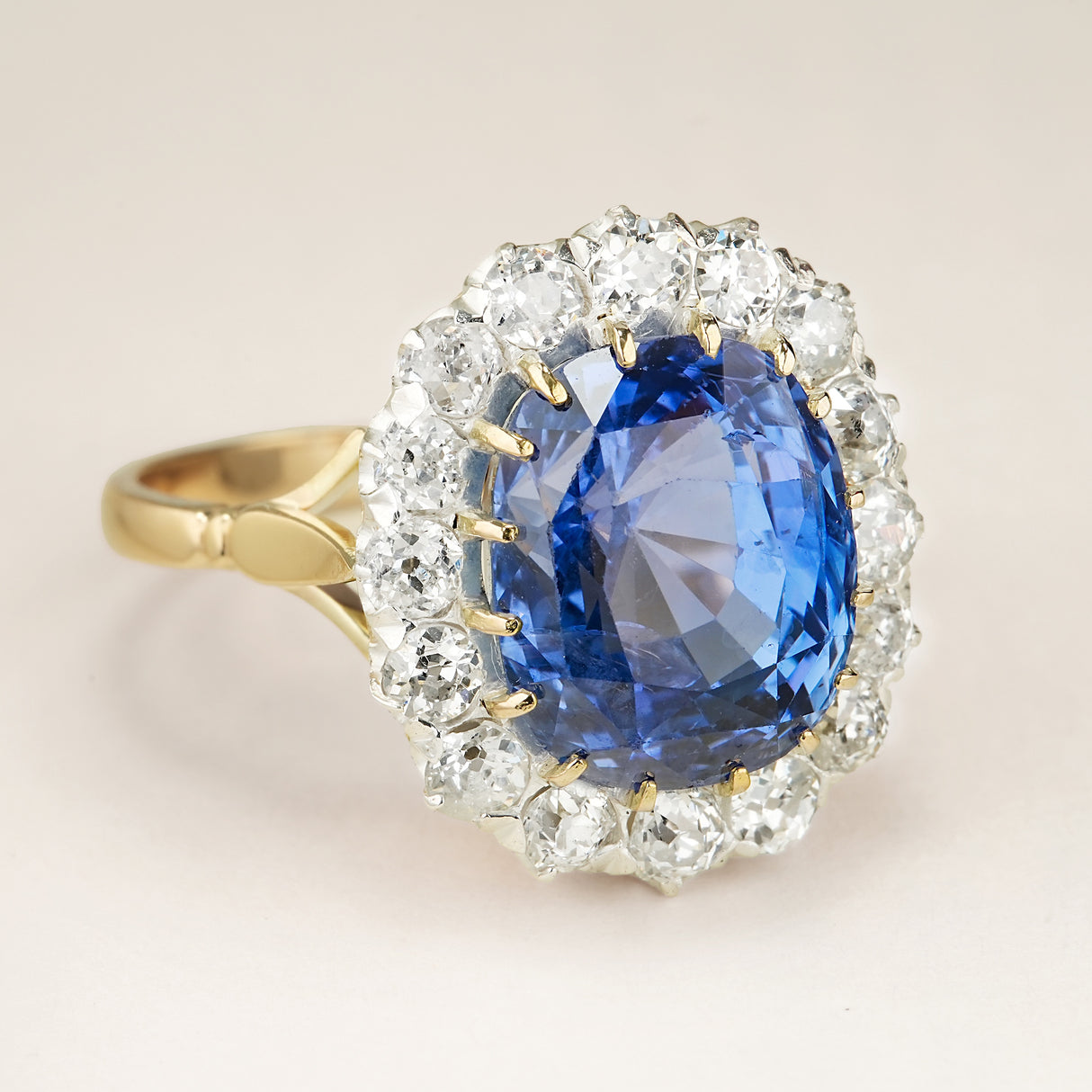 Antique, Edwardian sapphire and diamond cluster engagement ring