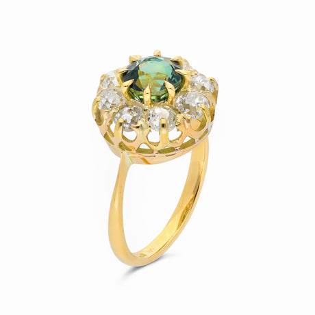 antique green sapphire and diamond cluster engagement ring, side view.