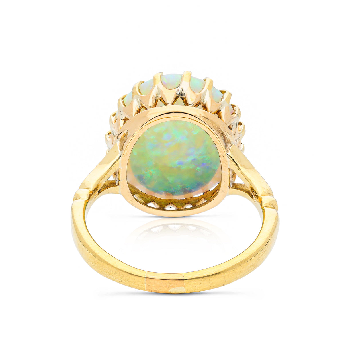 cabochon white opal cocktail ring with 18ct yellow gold band, back view. 