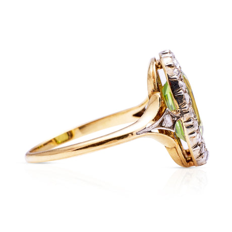 antique peridot and diamond ring, side view.