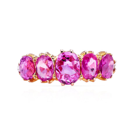 Five stone pink sapphire and yellow gold ring, front view