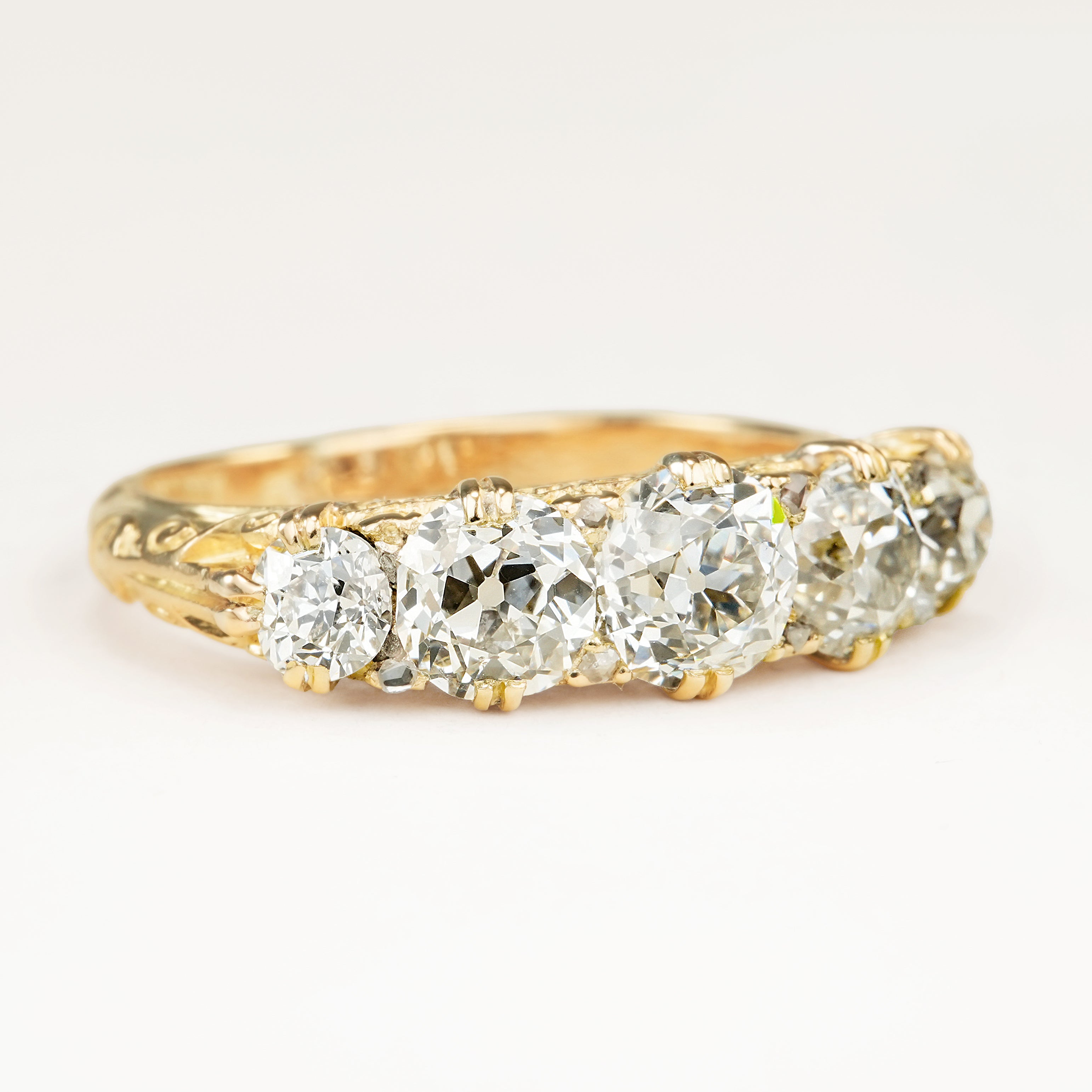 Antique, Edwardian old-cut diamond five-stone engagement ring